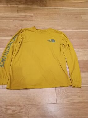 The North Face Men’s Long Sleeve Shirt in Mustard Yellow with Teal Logo